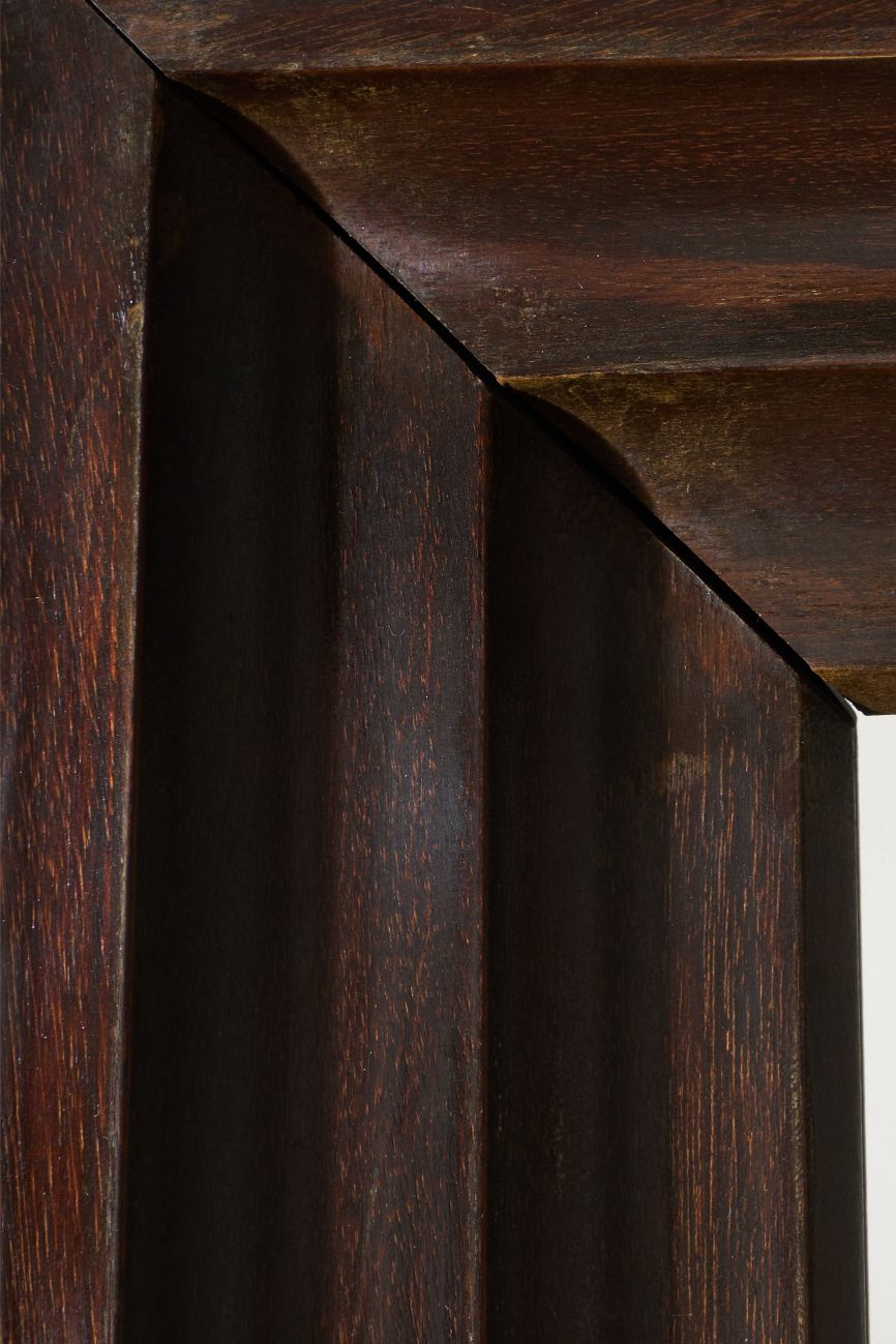 Unusual 20th century African hardwood moulded mirror