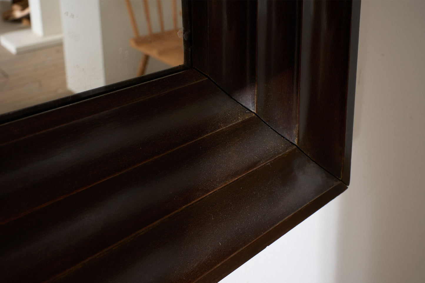 Unusual 20th century African hardwood moulded mirror