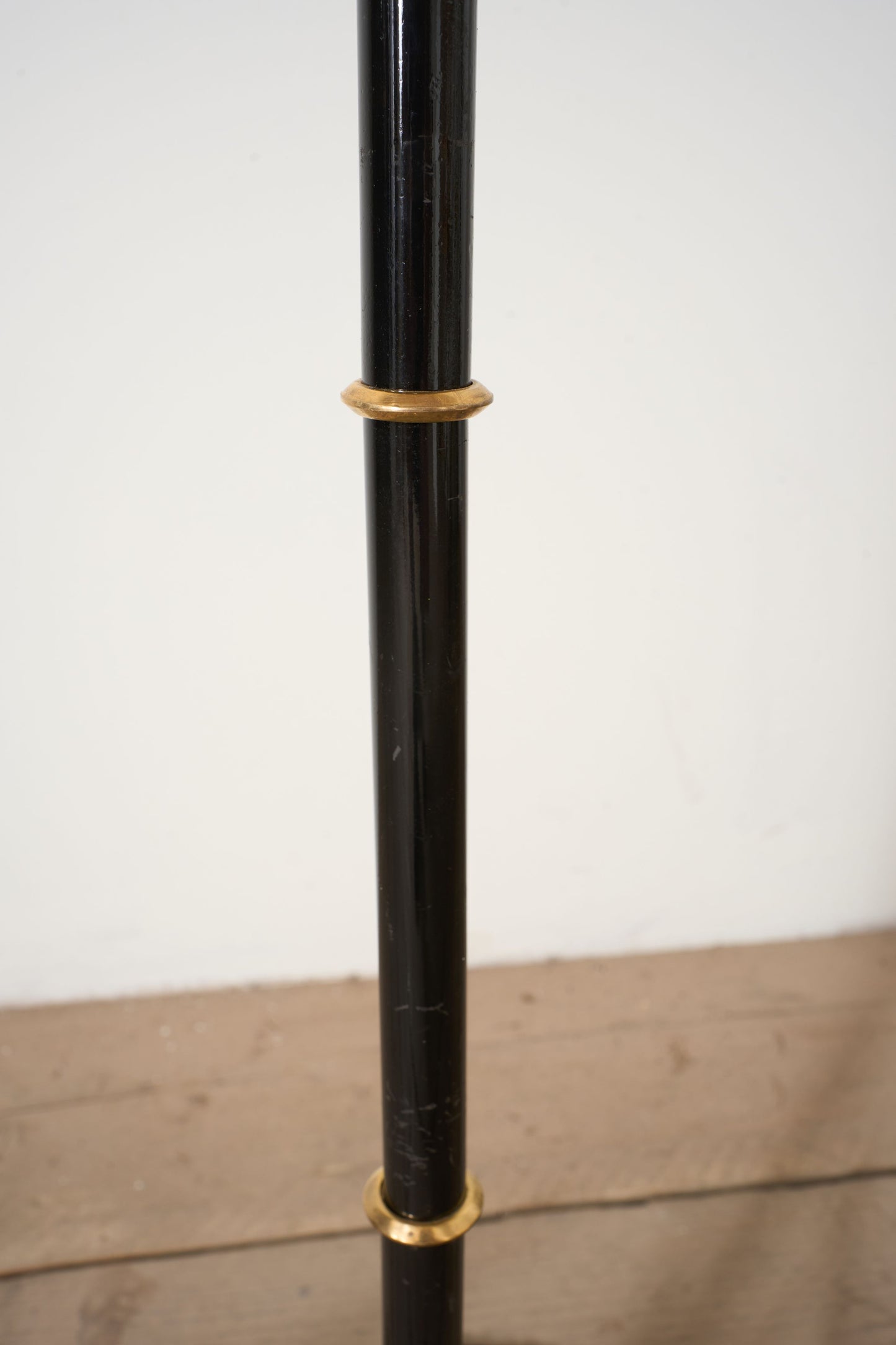 Mid 20th century black enamel and brass floor lamp