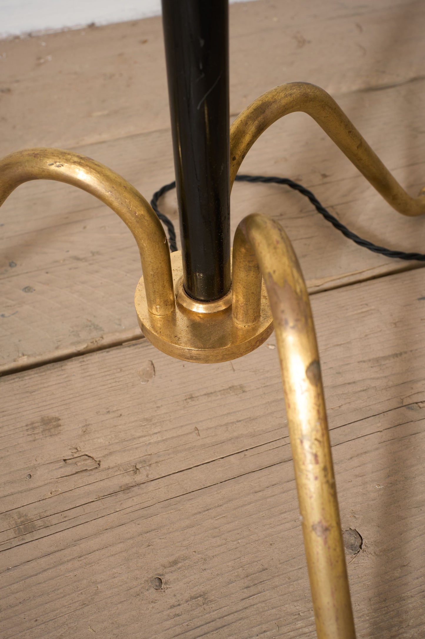 Mid 20th century black enamel and brass floor lamp