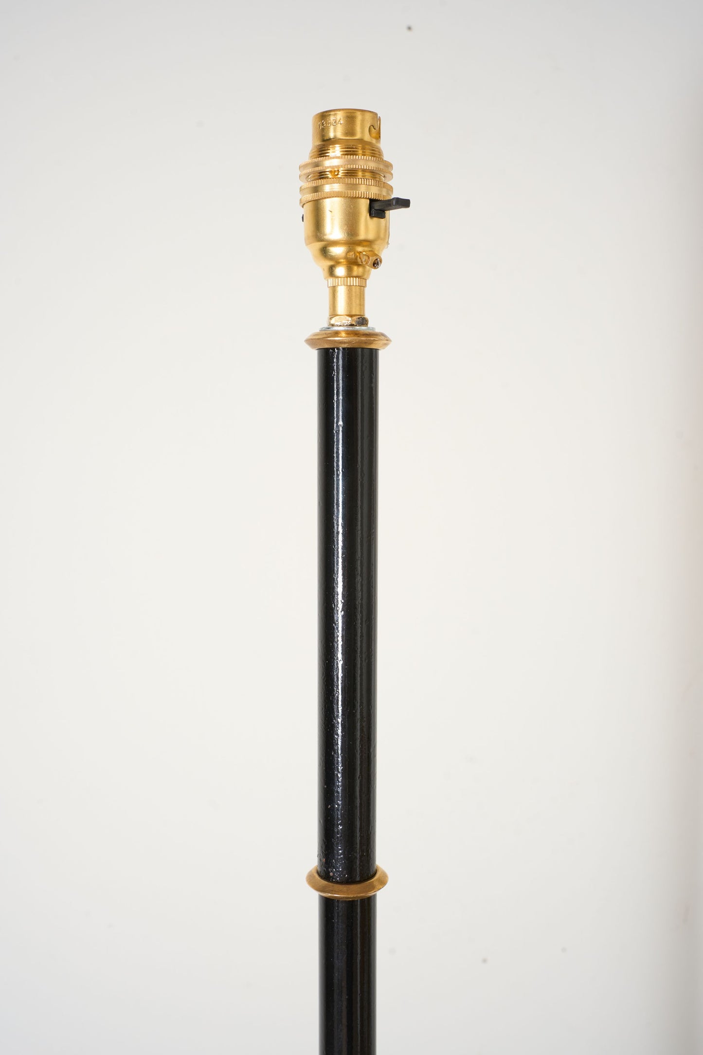 Mid 20th century black enamel and brass floor lamp