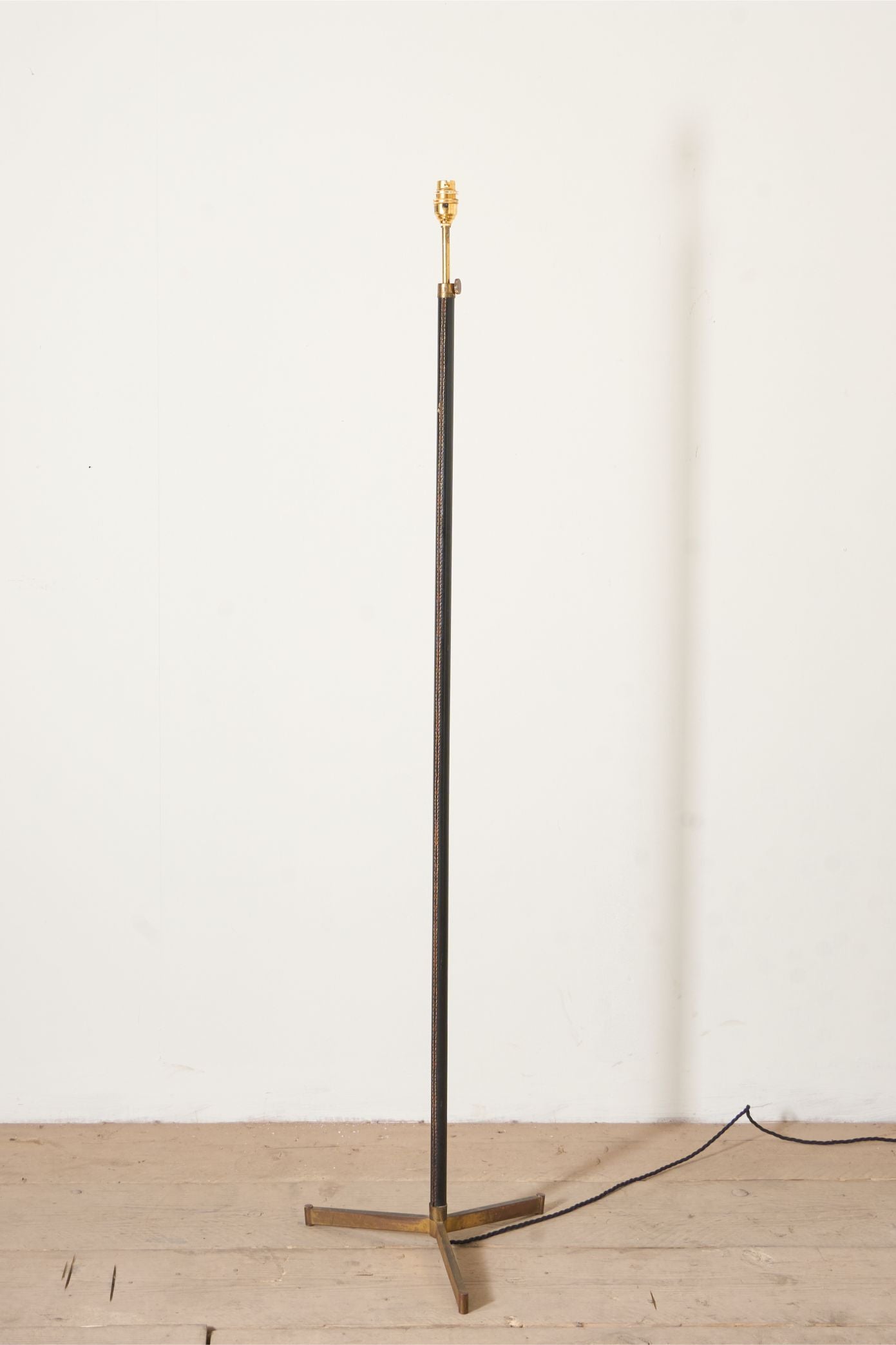 Mid 20th century Spanish black leather and brass floor lamp