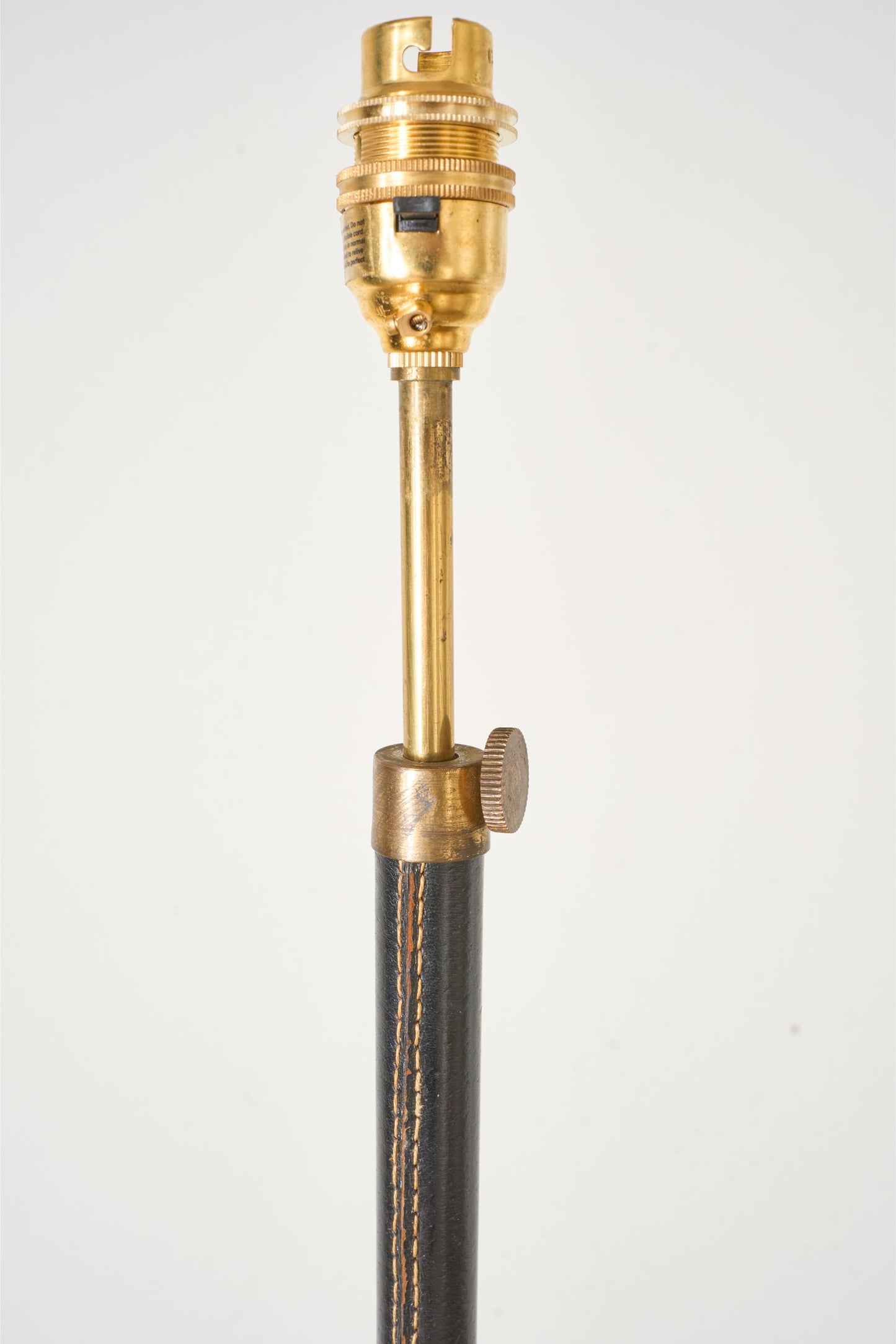 Mid 20th century Spanish black leather and brass floor lamp