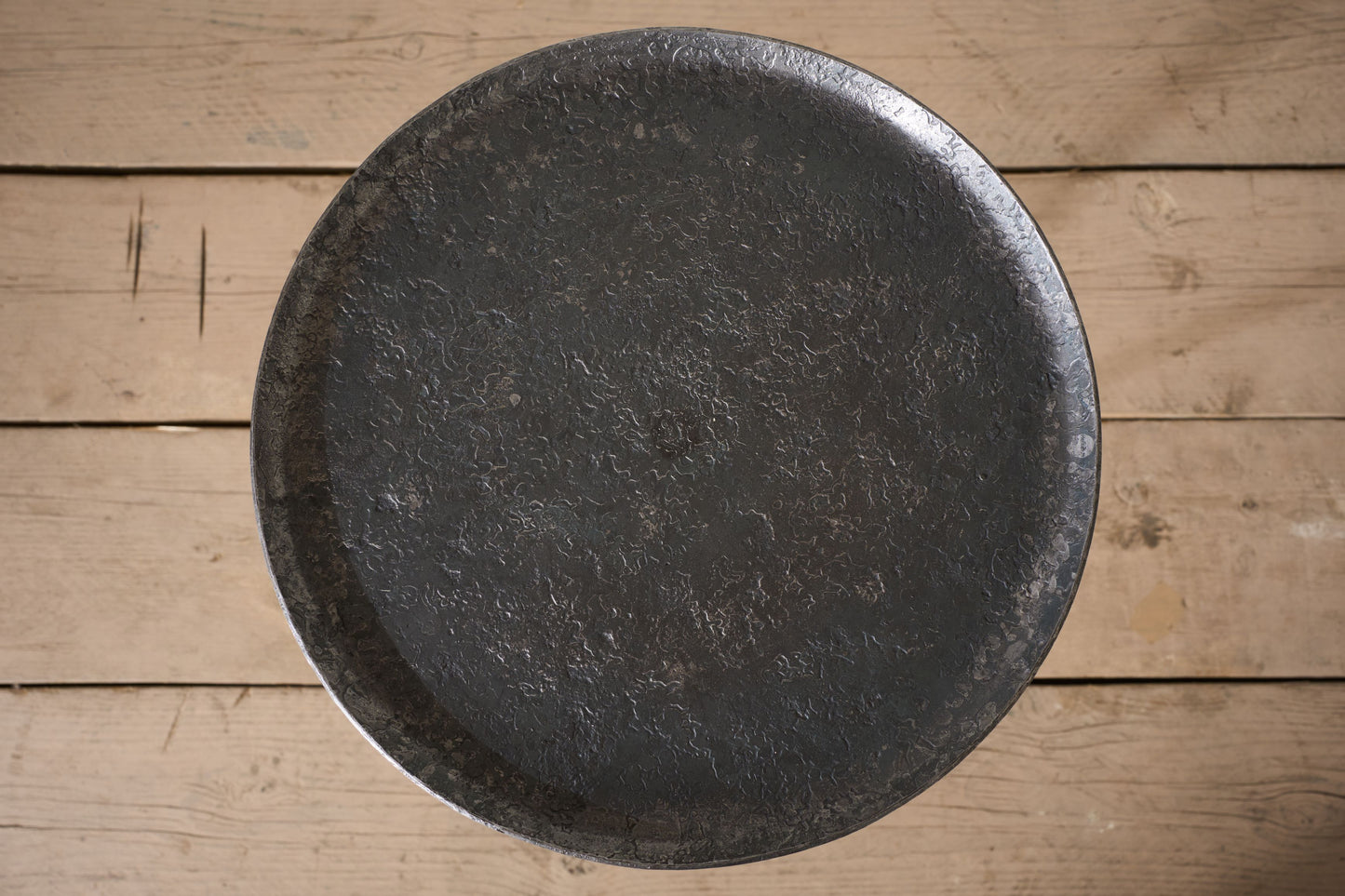 The 'Brokkr' Forged Steel Martini Table - Heavy texture