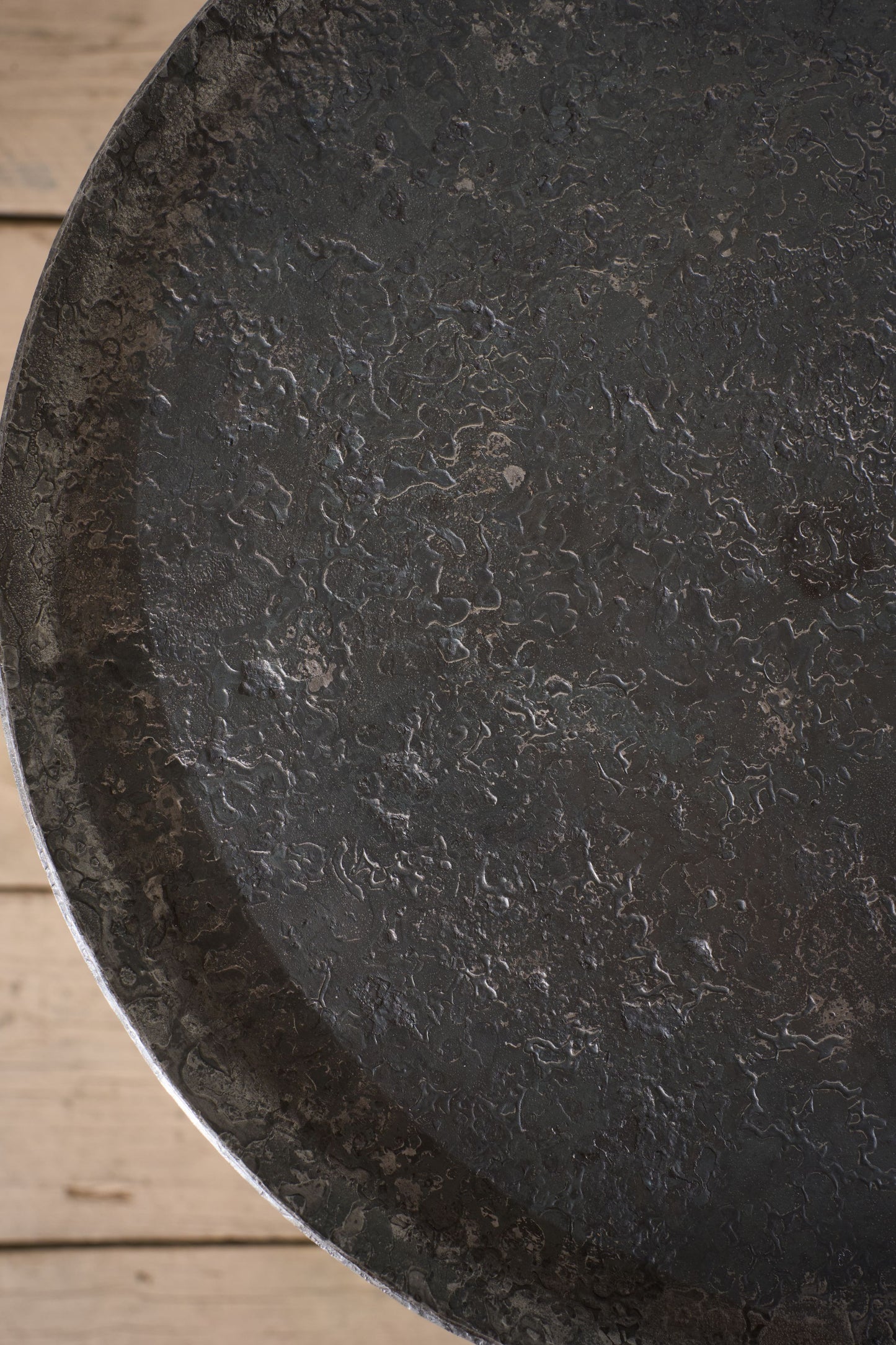The 'Brokkr' Forged Steel Martini Table - Heavy texture
