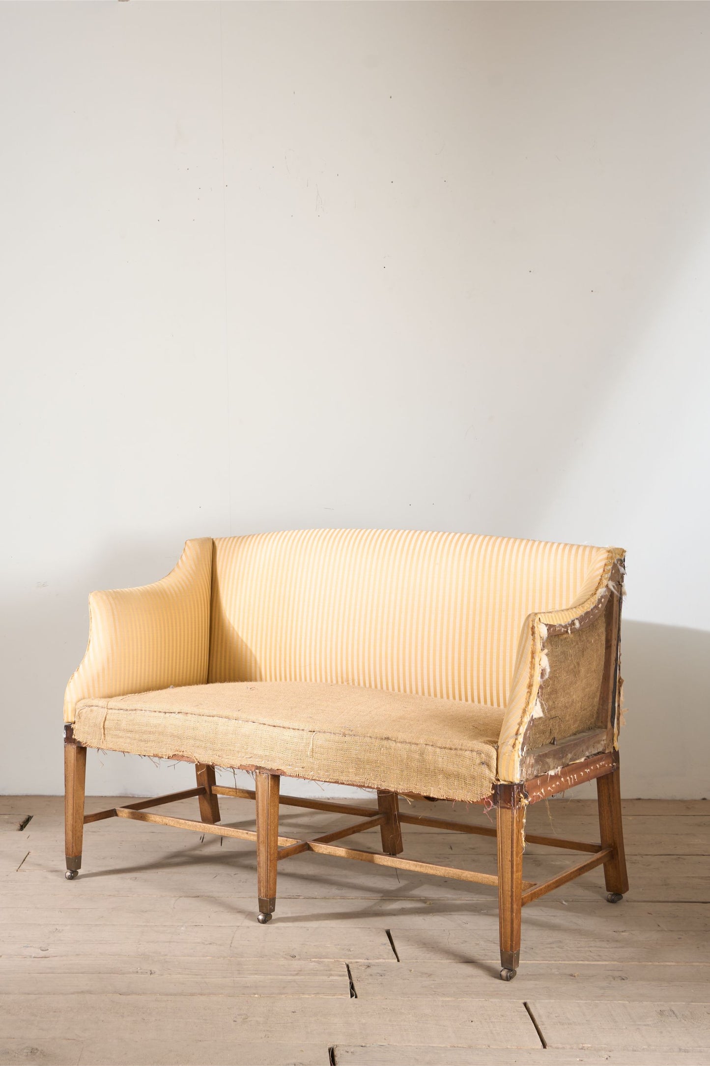 Georgian period Campaign sofa with tapered legs