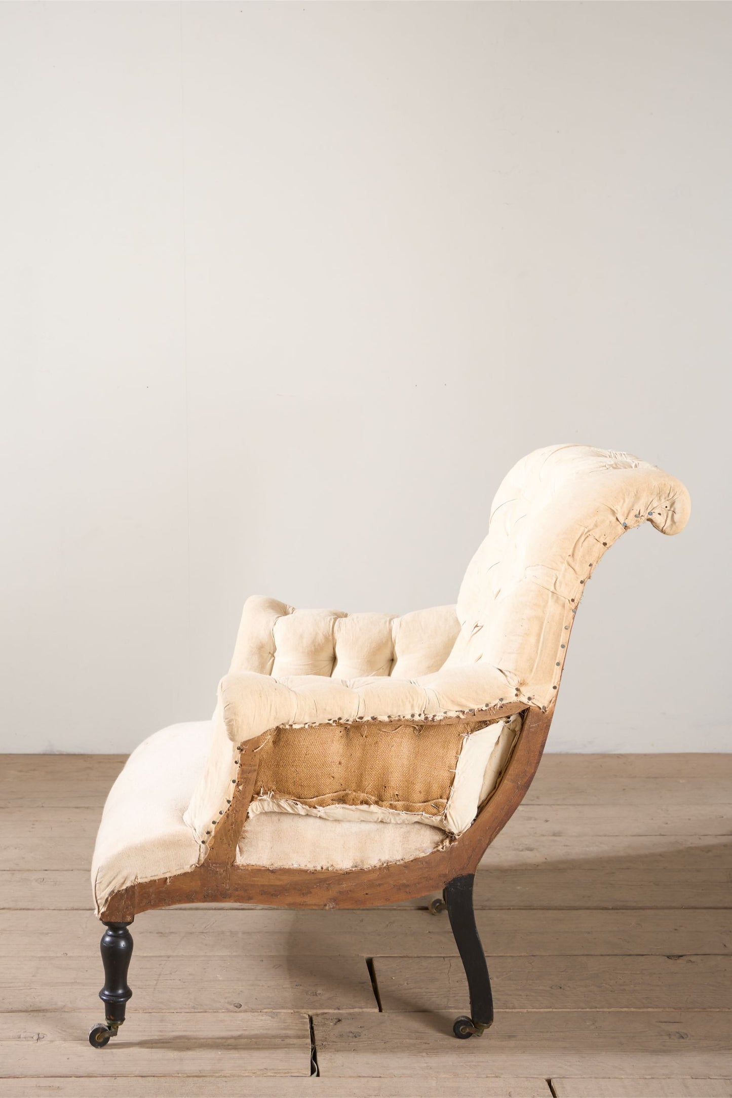 Napoleon III Buttoned scroll back armchair