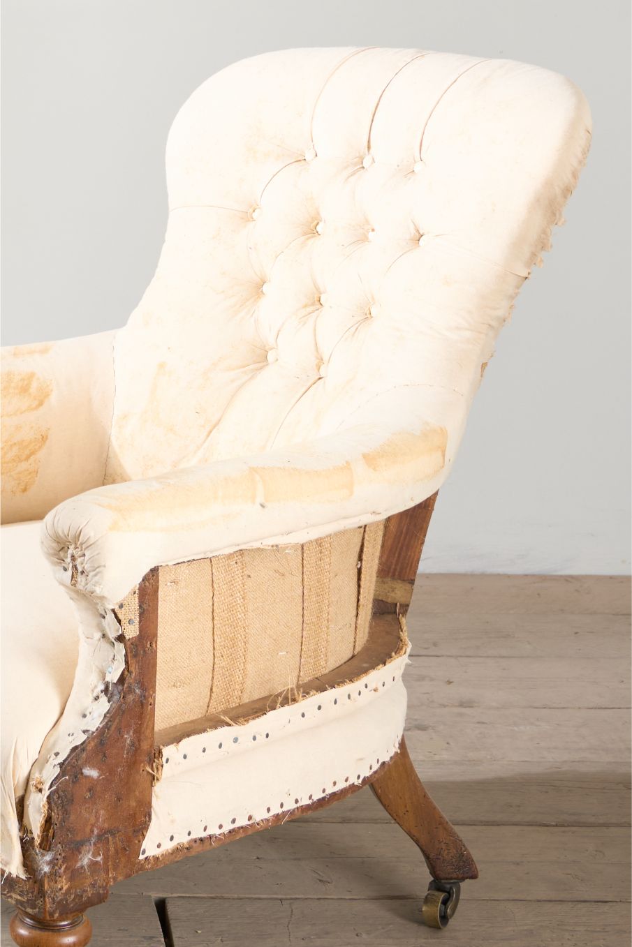 Early Victorian buttoned back country house armchair
