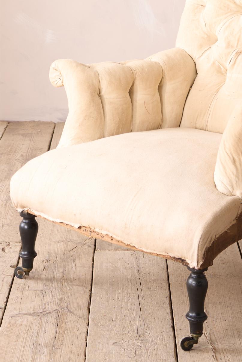 Napoleon III Buttoned scroll back armchair