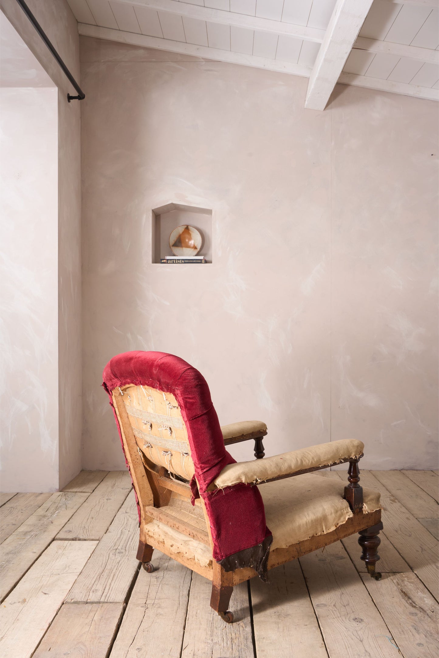 19th century buttoned back open armchair