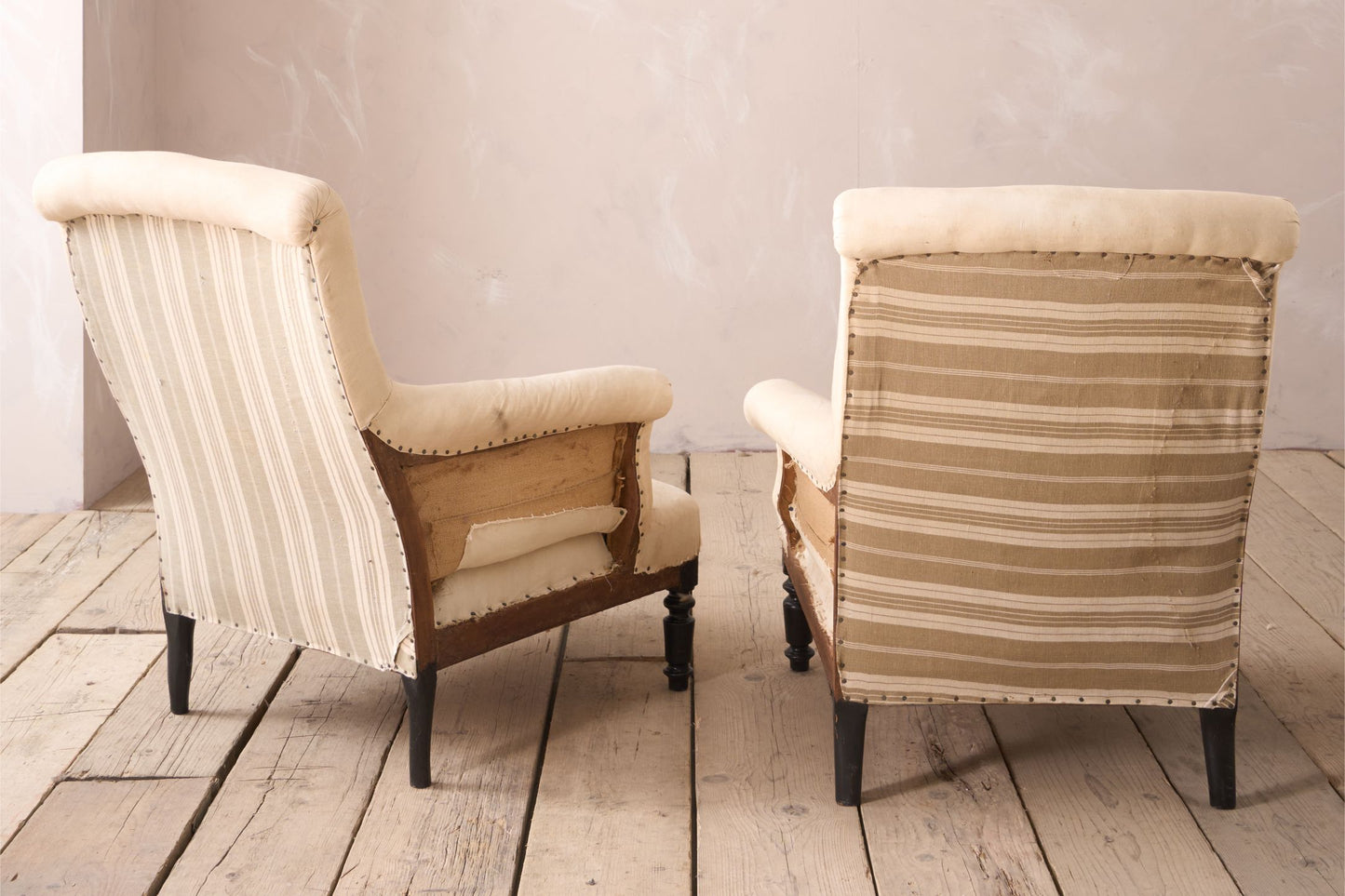 Pair of Napoleon III scroll back armchairs