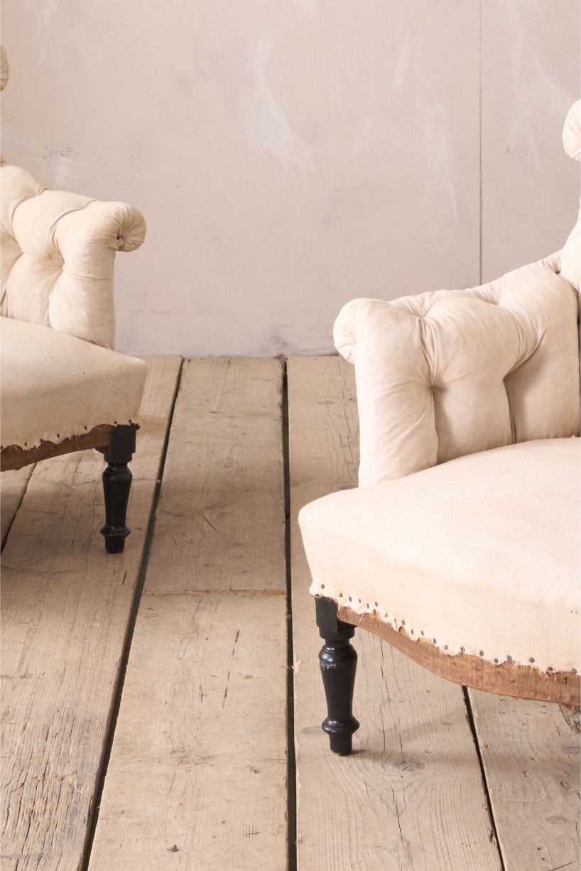 Pair of Napoleon III buttoned fishtail armchair