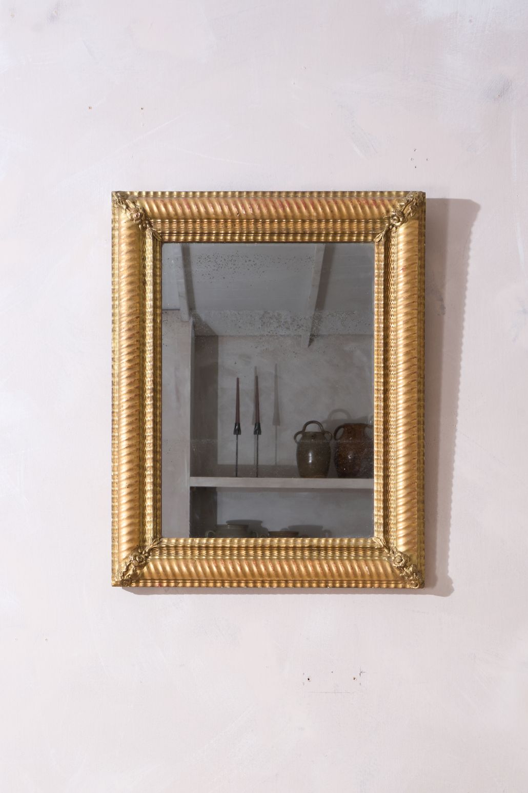 19th century Rippled gilt wall mirror