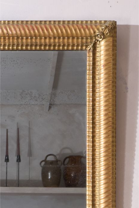19th century Rippled gilt wall mirror