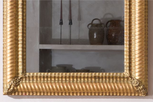 19th century Rippled gilt wall mirror