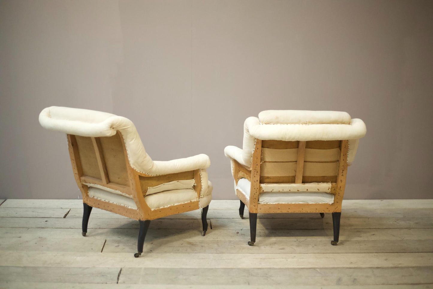 Pair of Napoleon III scroll back pie crust armchairs