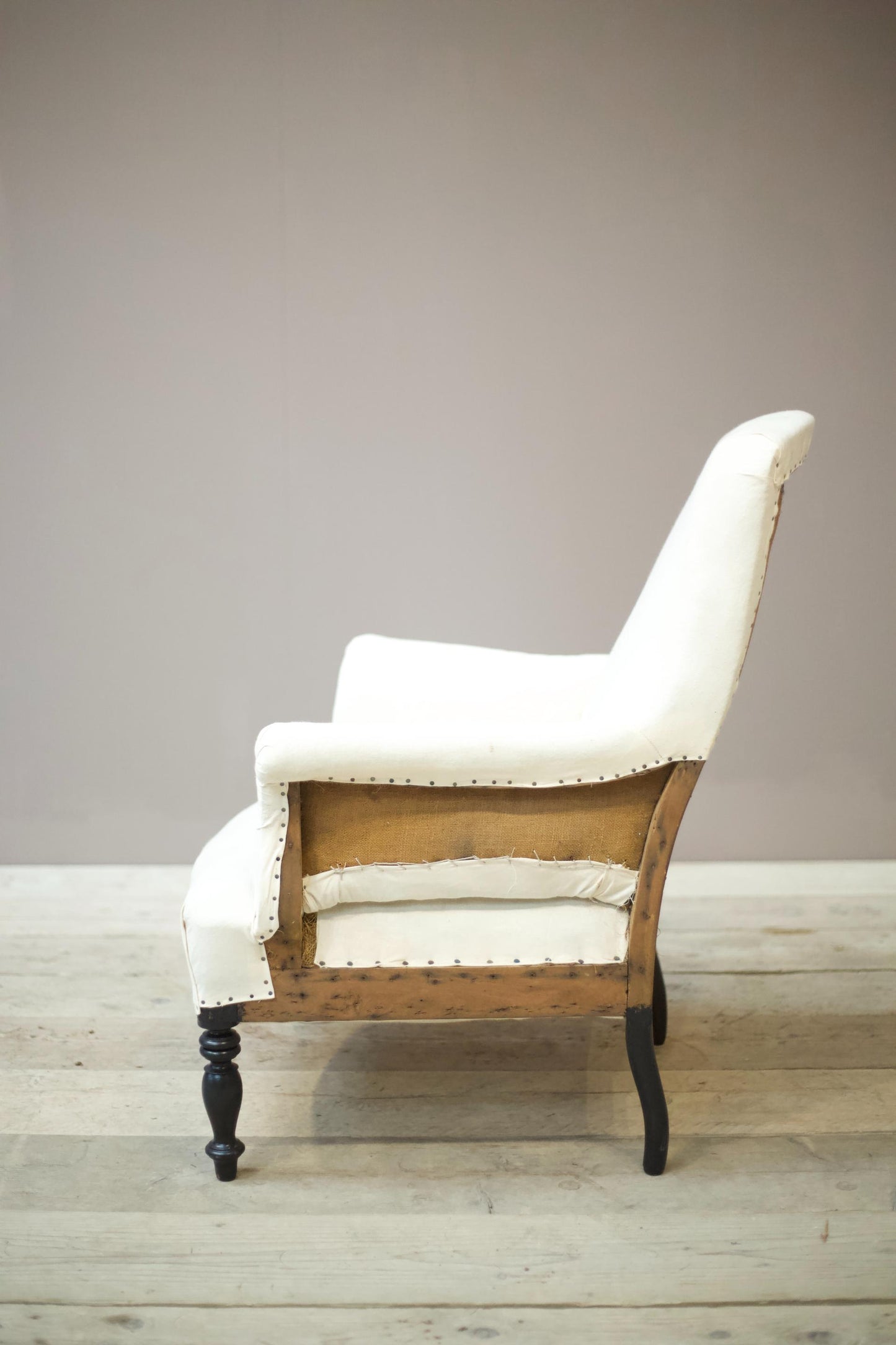 Single Napoleon III Square back armchair with tall turned legs