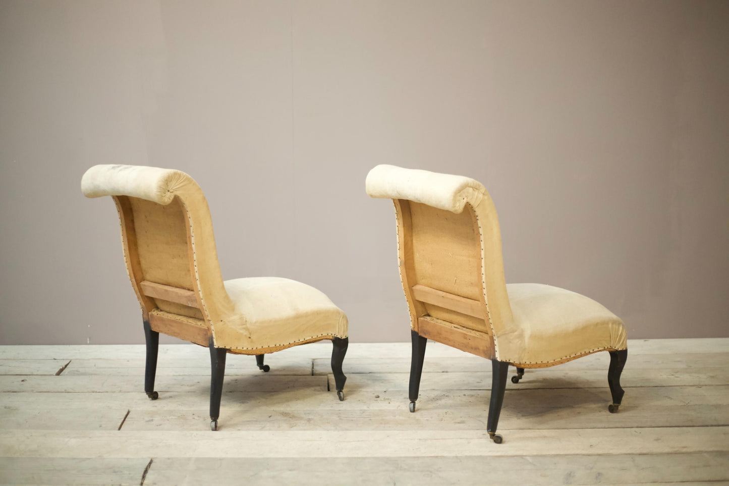 Pair of Napoleon III scroll back nursing chairs