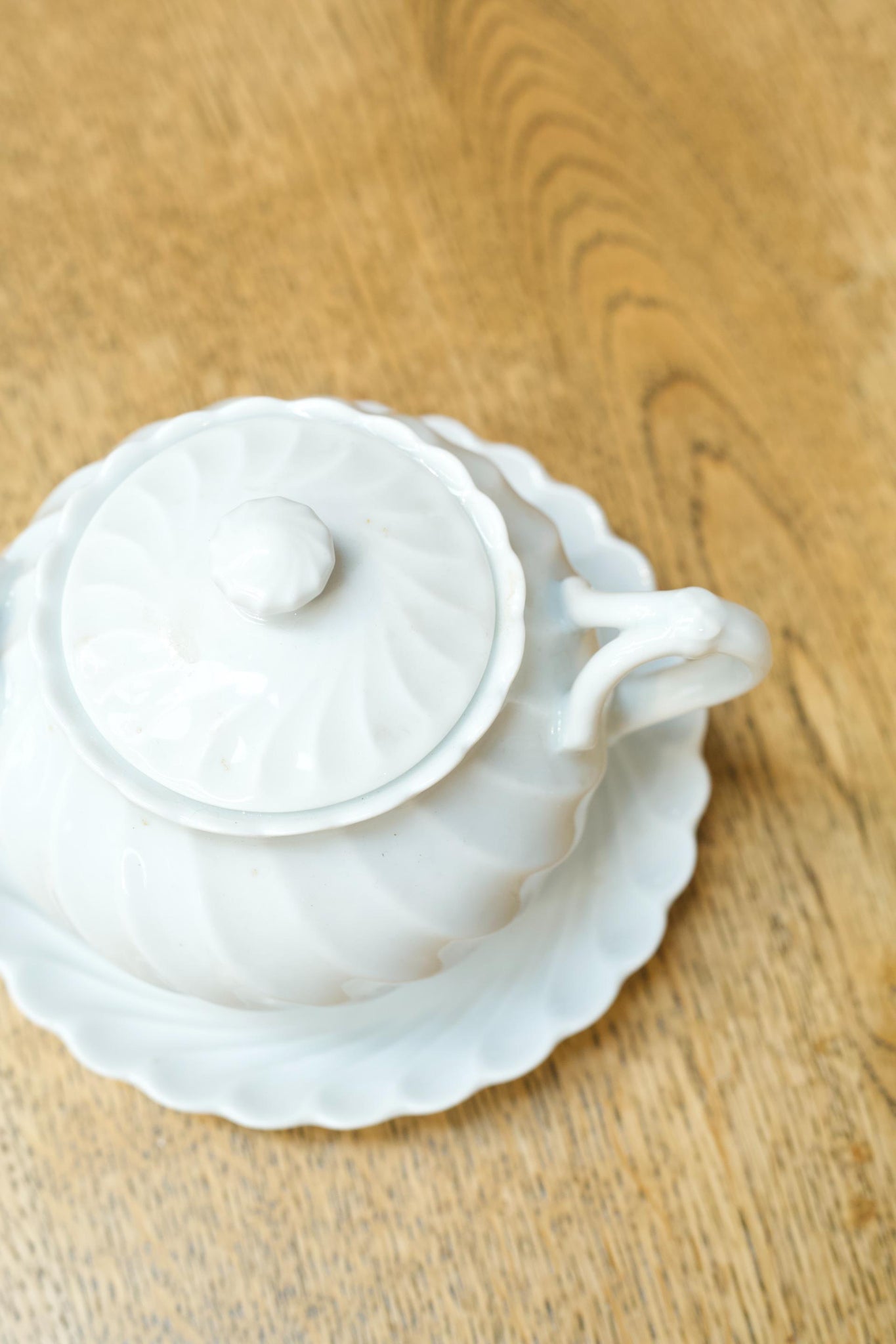 Vintage white porcelain sugar bowl and saucer