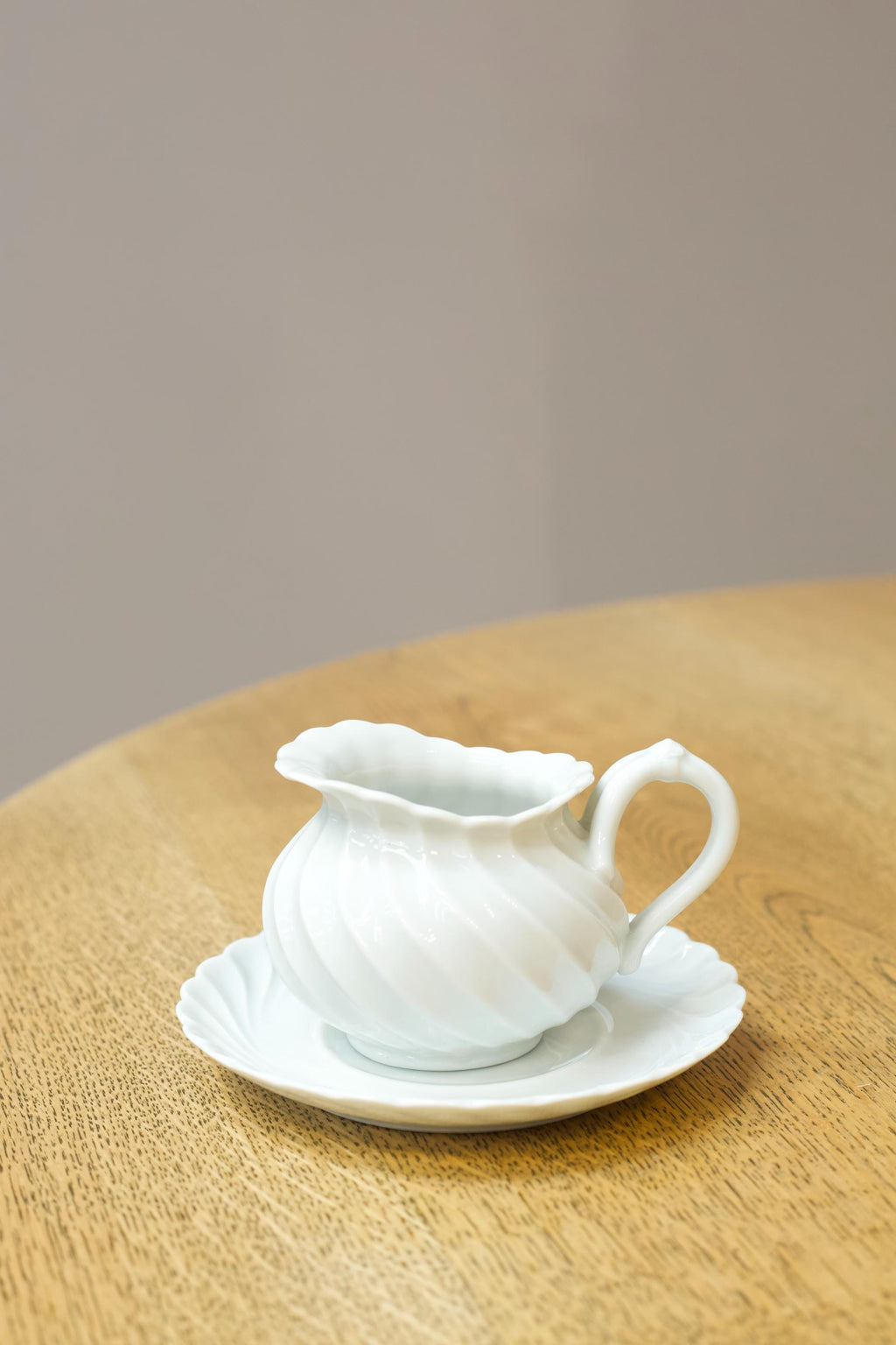 Vintage white porcelain milk jug and saucer TallBoy Interiors