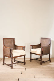 Pair of c.1920 barley twist mahogany rattan lounge chairs
