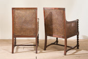 Pair of c.1920 barley twist mahogany rattan lounge chairs
