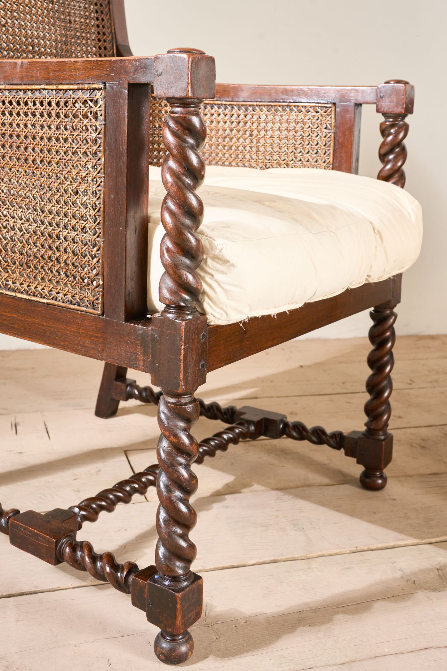 Pair of c.1920 barley twist mahogany rattan lounge chairs