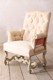 Pair of 19th century French buttoned back armchairs with painted carved frame