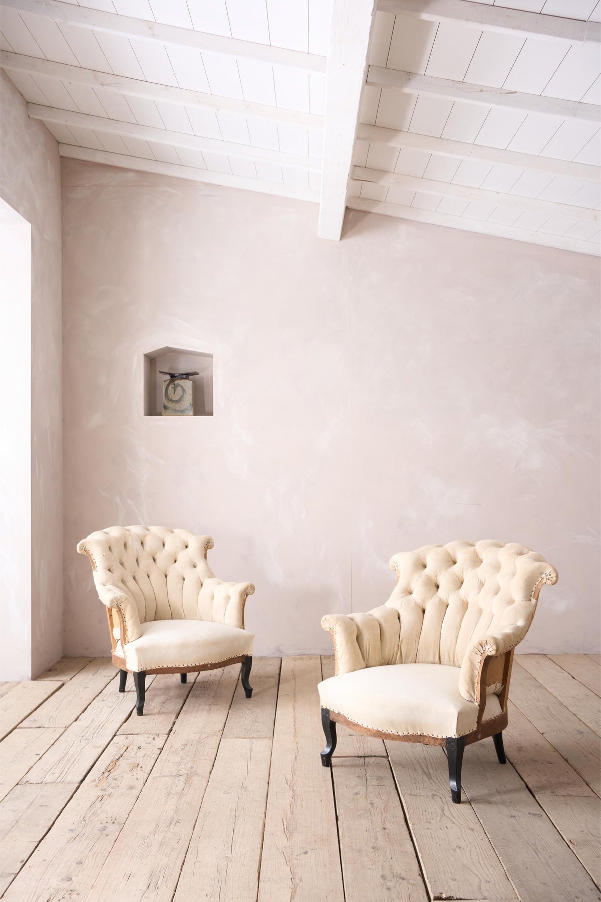 Pair of Napoleon III buttoned fishtail armchairs