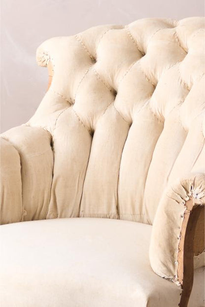 Pair of Napoleon III buttoned fishtail armchairs
