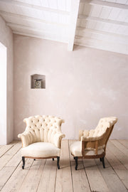 Pair of Napoleon III buttoned fishtail armchairs