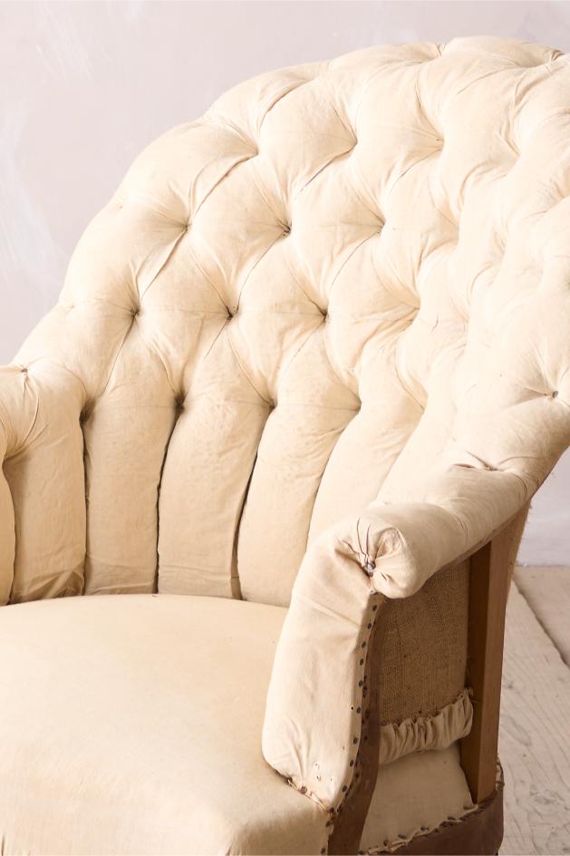 Napoleon III buttoned curved back armchair