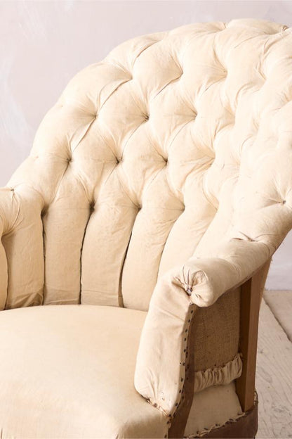 Napoleon III buttoned curved back armchair