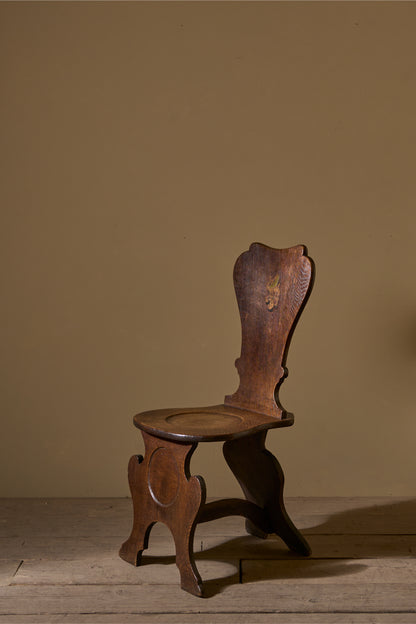 18th century English oak shield back hall chair