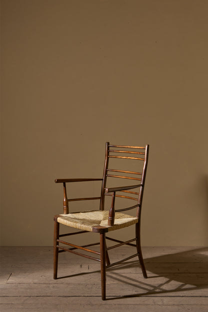 Arts & Crafts English oak and rush seat armchair
