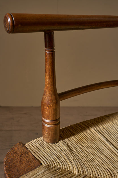 Arts & Crafts English oak and rush seat armchair