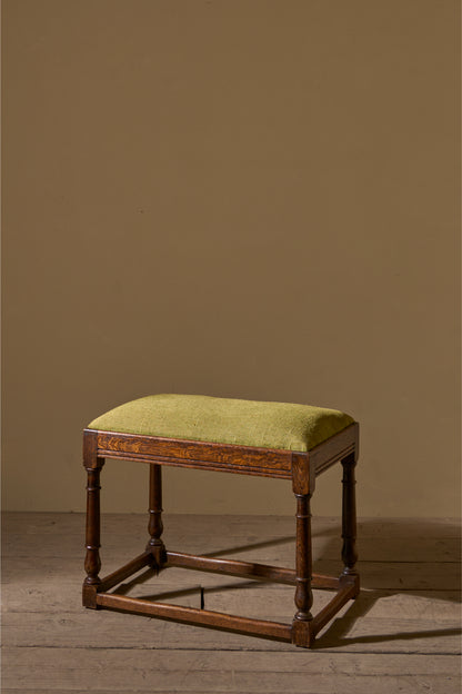 19th century Oak footstool in heavy green linen