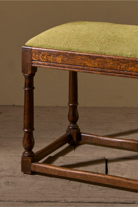 19th century Oak footstool in heavy green linen