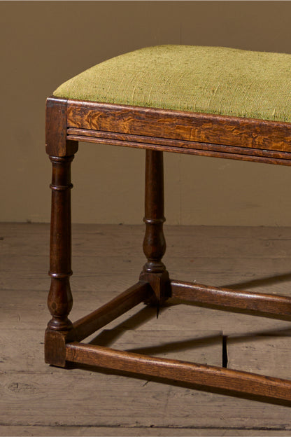 19th century Oak footstool in heavy green linen