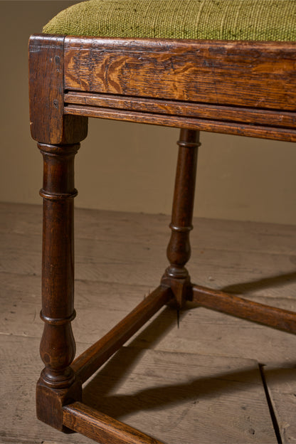 19th century Oak footstool in heavy green linen