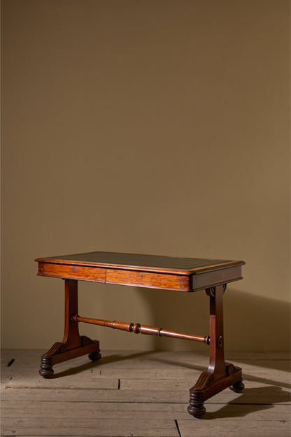 Early Victorian mahogany and black leather writing table by Johnstone & Jeanes
