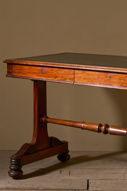 Early Victorian mahogany and black leather writing table by Johnstone & Jeanes