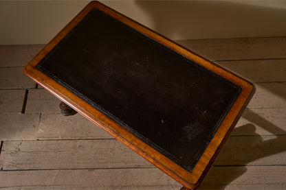 Early Victorian mahogany and black leather writing table by Johnstone & Jeanes