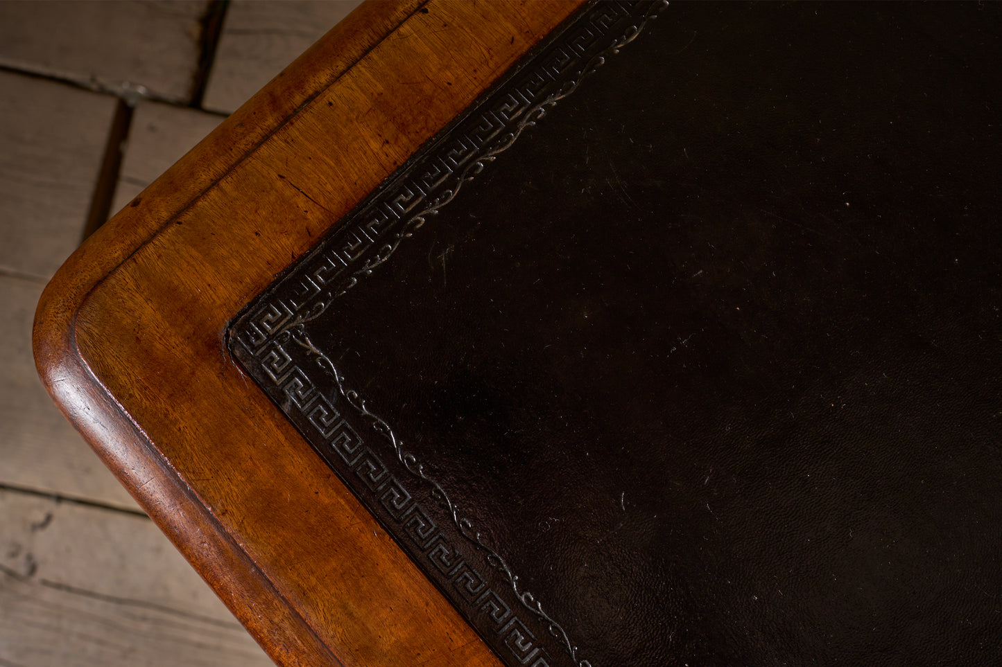 Early Victorian mahogany and black leather writing table by Johnstone & Jeanes