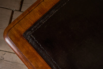 Early Victorian mahogany and black leather writing table by Johnstone & Jeanes