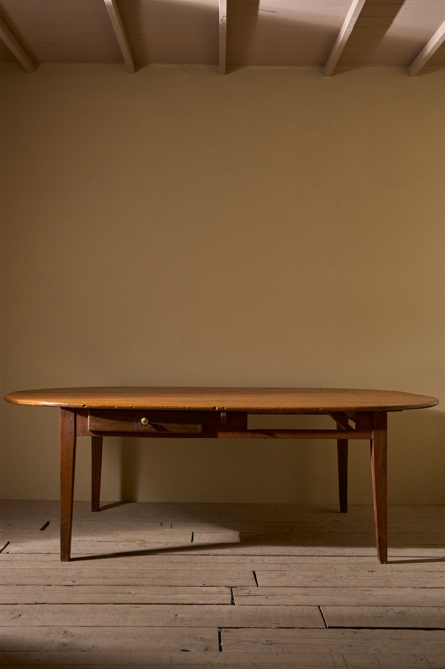 19th century French oak and fruitwood oval dining table