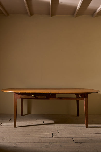 19th century French oak and fruitwood oval dining table