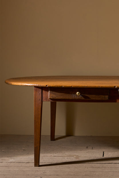 19th century French oak and fruitwood oval dining table