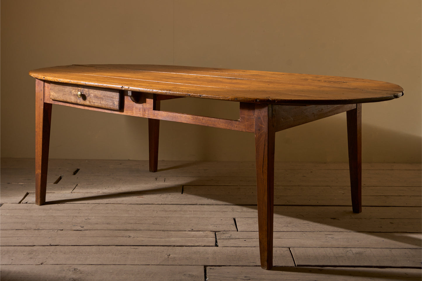 19th century French oak and fruitwood oval dining table