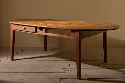 19th century French oak and fruitwood oval dining table